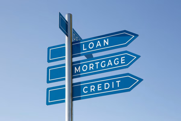 Loan Mortgage Credit words on signpost isolated on sky background