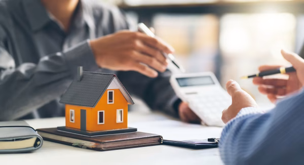 Real estate agent talked about the terms of the home purchase agreement and asked the customer to sign the documents to make the contract legally, Home sales and home insurance concept.
